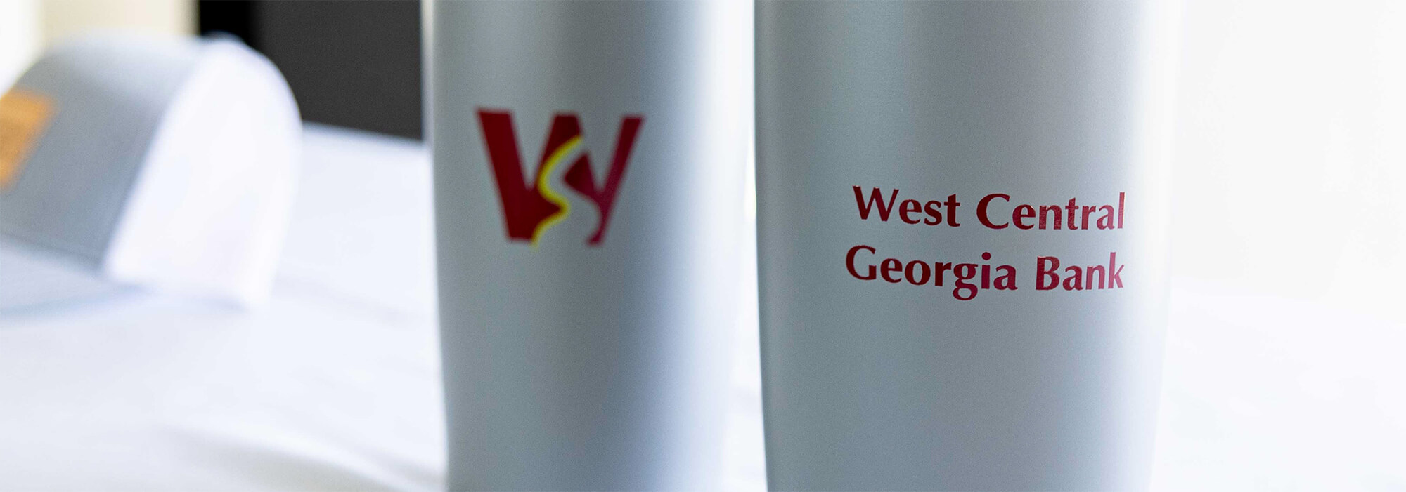 Coffee cups with the bank logo